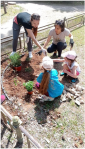 Children from Ukraine participate in a hands-on garden day as part of HWB events