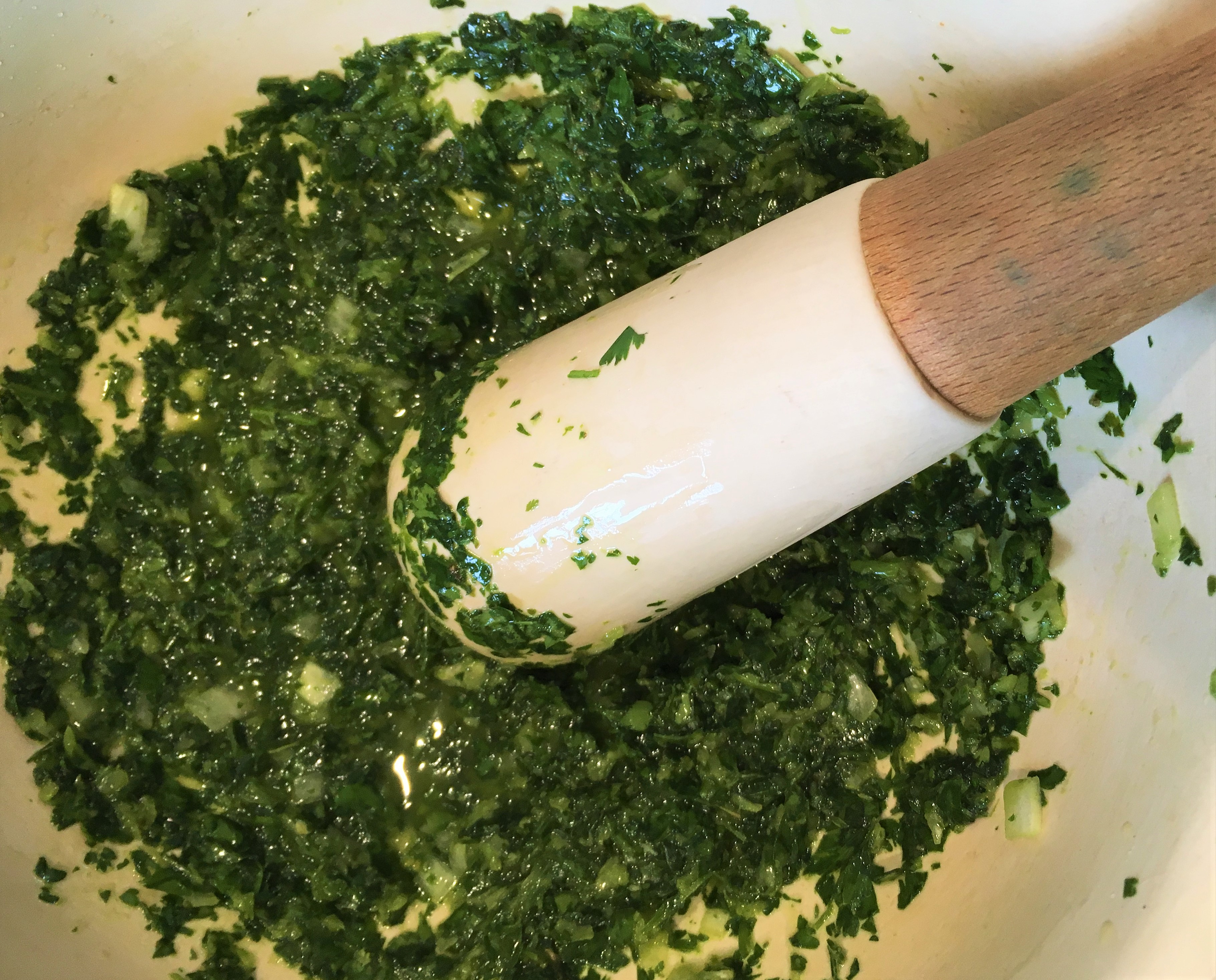 making salsa verde in mortar and pestle